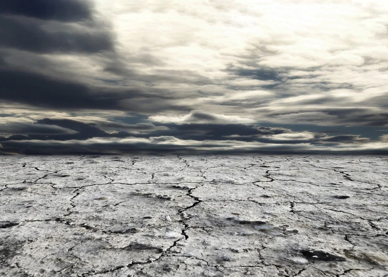 a barren area with a cloudy sky in the background, a photo, by Alexander Scott, shutterstock, dry ice, scientific earth crust, vertical wallpaper, 1/30