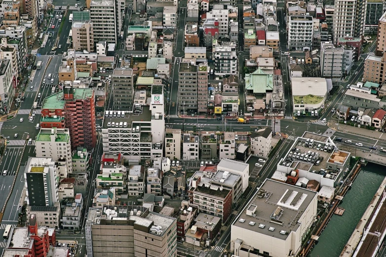 a city filled with lots of tall buildings, inspired by Takeuchi Seihō, flickr, houses and roads, gigapixel, kumamoto, close-up!!!!!!