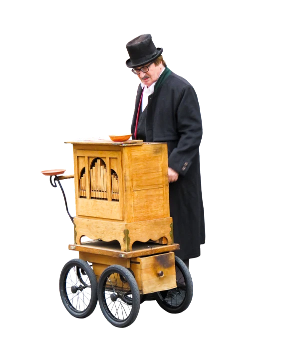 a man in a top hat standing next to a wooden cart, flickr, musical organ, flying magic books, photo taken in 2 0 2 0, delivering parsel box