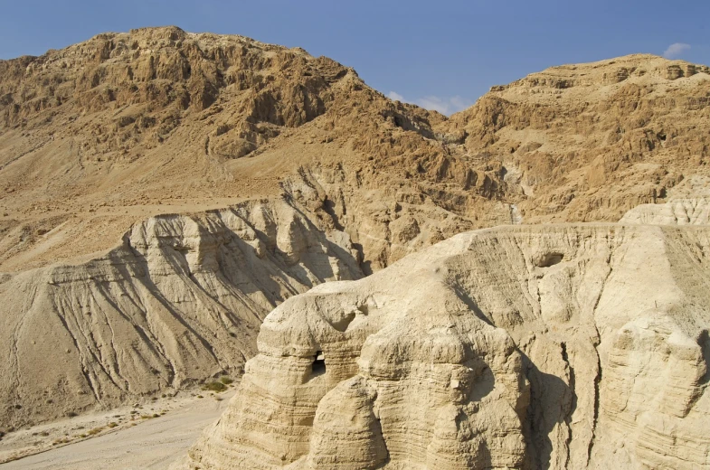 a person riding a horse in the desert, by Jankel Adler, shutterstock, les nabis, stone grotto in the center, hebrew, erosion channels river, 3 meters