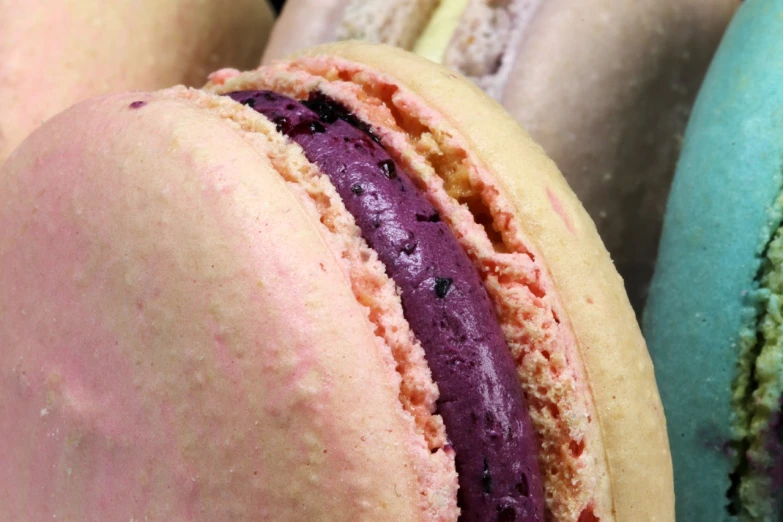 a close up of a bunch of macarons, inspired by François Louis Thomas Francia, blueberry, closeup - view, mangosteen, grain”