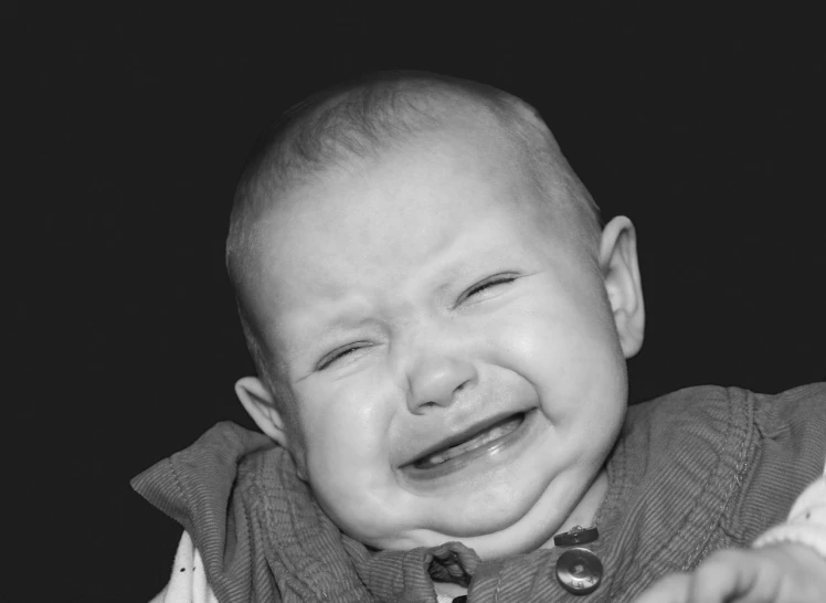 a black and white photo of a baby crying, a black and white photo, by James Warhola, fine art, smiley, sfw, plain background, a brightly coloured