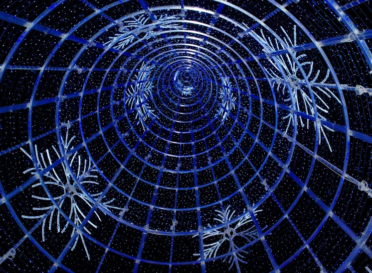 a bunch of snowflakes that are in the shape of a spiral, by Jon Coffelt, shutterstock, space art, wires earth background, cool skydome, dense coniferous forest. spiders, grid and web