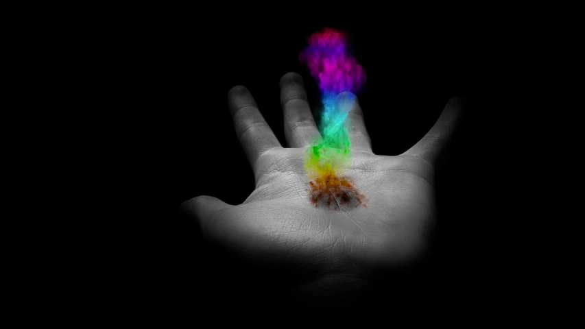 a person holding a rainbow colored object in their hand, digital art, by Jan Rustem, flickr, synchromism, smoking rock, selective color effect, glowing dust, high detail of a hand