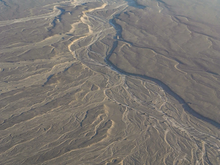 an aerial view of a river running through a desert, by Erwin Bowien, flickr, volcano texture, nepal, huge details, mojave desert