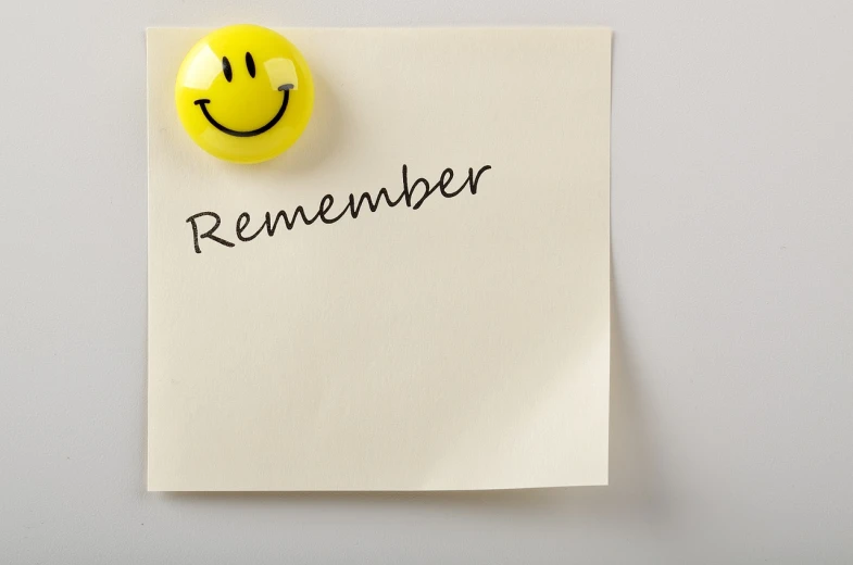 a piece of paper with a smiley face drawn on it, by Nina Hamnett, happening, remembrance, joyous wide memorable, (1 as december, ink on post it note