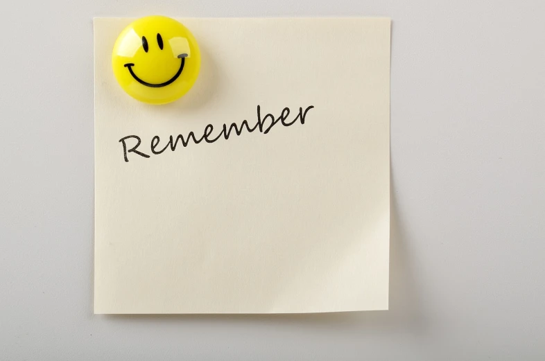 a piece of paper with a smiley face drawn on it, by Nina Hamnett, happening, remembrance, joyous wide memorable, (1 as december, ink on post it note