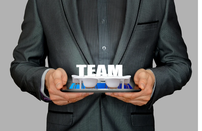 a man in a suit holding a tablet with the word team on it, a digital rendering, bauhaus, thick rimmed-glasses, professional sports style, tourist photo, teams