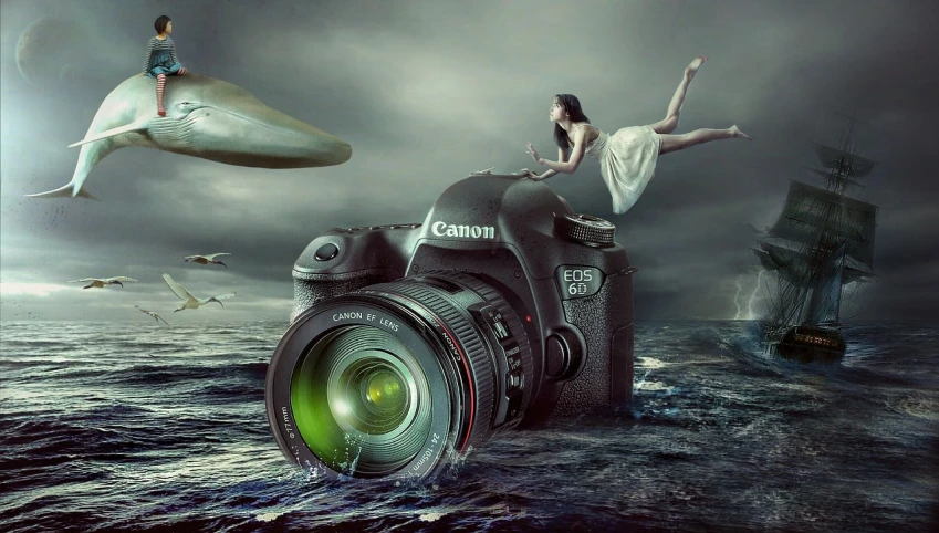 a woman sitting on top of a camera next to a whale, digital art, inspired by Annie Leibovitz, pixabay contest winner, canon eos 6d, !!! shallow depth of field!!!, the flying dutchman, making of