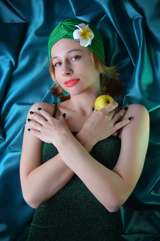 a woman in a green dress holding an apple, a portrait, inspired by Tamara de Lempicka, flickr, concept photoset, lemon, taken in the early 2020s, cute girl