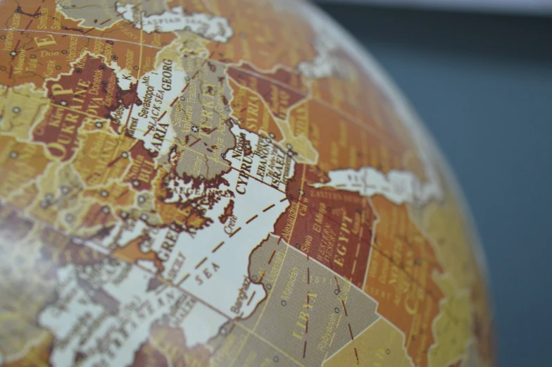 a close up of a map of the world, excessivism, spherical, nostalgic atmosphere, emir, inside a globe