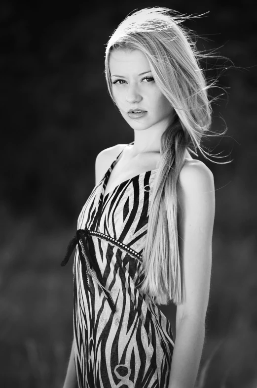 a black and white photo of a woman in a zebra print dress, featured on cgsociety, long braided blond hair, ukrainian girl, crisp smooth lines, portrait of maci holloway