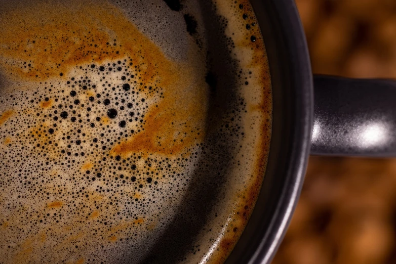 a close up of a cup of coffee, a macro photograph, boiling, top down photo, 8 k detail post - processing, some rust