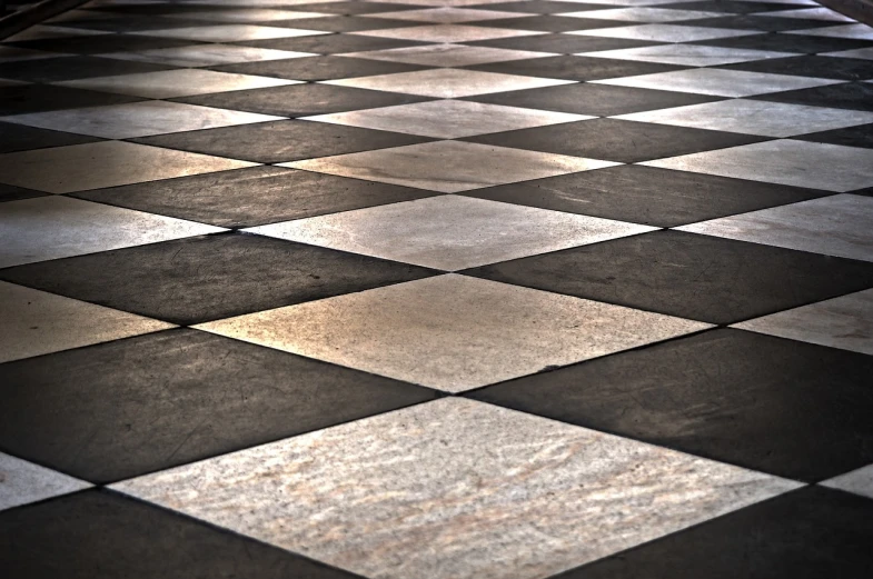 a close up of a black and white checkered floor, a raytraced image, by Jan Kupecký, shutterstock, baroque, stone floor, evening light, colored marble, hdr raytracing