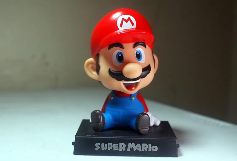 a close up of a nintendo super mario figurine, my pov, wide nose!!!, a super-smart, toy camera