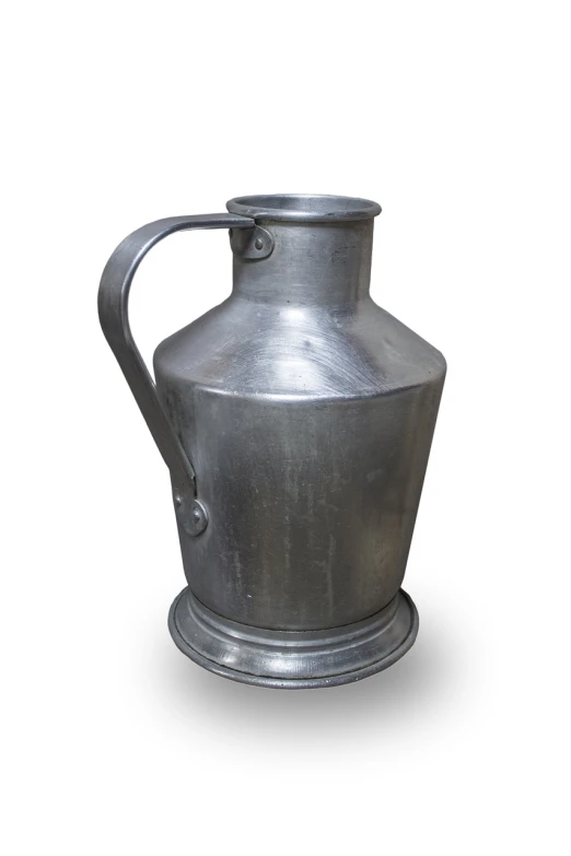 a metal pitcher sitting on top of a white surface, by Viktor de Jeney, shutterstock, folk art, of a old 15th century, high detail product photo, detailed product photo, grey metal body