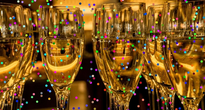 a bunch of champagne glasses sitting on top of a table, a picture, pexels, pointillism, vibrant color with gold speckles, new years eve, avatar image, edited