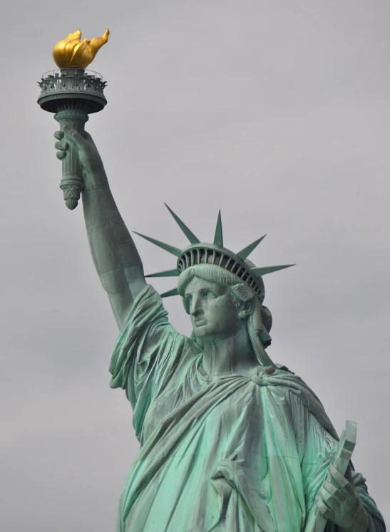 a statue of liberty holding a torch in her hand, a statue, figuration libre, front top side view, photo taken in 2018, 2 0 1 0 photo