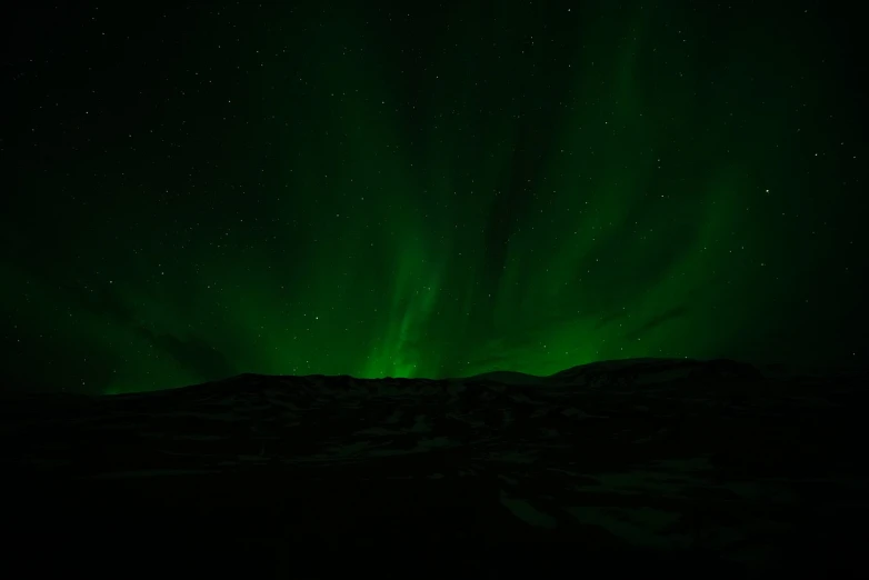 the aurora bore lights up the night sky, by Jørgen Nash, pexels, green hills, 1 0 2 4 x 7 6 8, glowing black aura, glowing snow