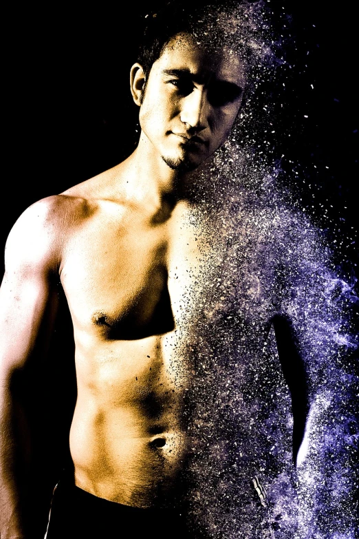 a shirtless man standing in front of a black background, an airbrush painting, inspired by Byron Galvez, flickr, sand particles, asian man, magical sparkling colored dust, foreground background