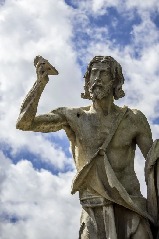 a statue of a man holding a sword, inspired by Theophanes the Greek, pixabay, jesus alonso iglesias, pisces, holding scimitar made of bone, looking to the sky
