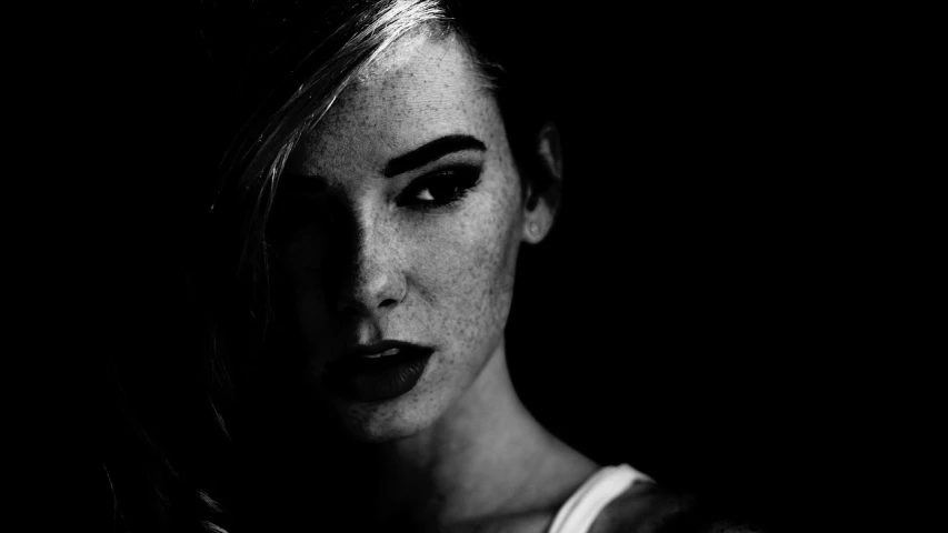 a black and white photo of a woman's face, by Matthias Weischer, tumblr, digital art, high contrast dappled lighting, 5 0 0 px models, freckled pale skin, young woman in her 20s