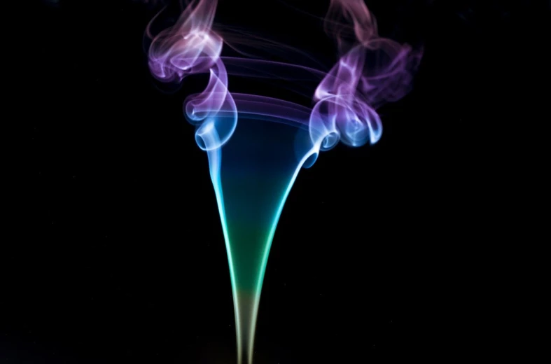 a close up of smoke on a black background, a macro photograph, by Jan Rustem, holography, casting a multi colored spell, magical and alchemical weapons, purple and blue colored, shot with canon 5 d mark ii