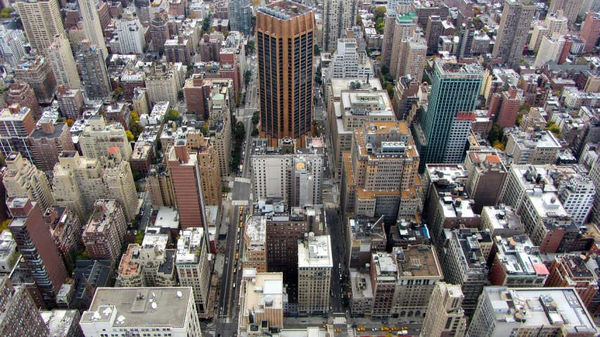 a view of a city from the top of a building, by Jon Coffelt, flickr, ny, skewed perspective, looking from side!, [ overhead view ]!!