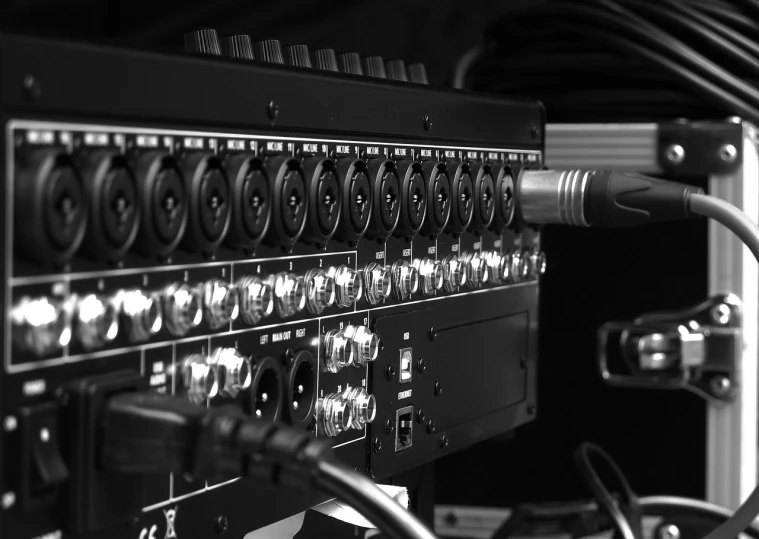 a black and white photo of a control panel, by Ejnar Nielsen, shutterstock, live concert lighting, panavision psr r-200, close up shot from the side, cables and tubes