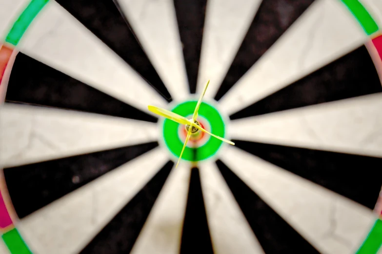 a close up of a dart in a bulls eye, a screenshot, by Dietmar Damerau, pexels, precisionism, a green, waiting to strike, my pov, istockphoto