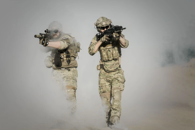 a couple of soldiers that are standing in the dirt, a picture, shutterstock, firearms photography, soldiers running, no text!