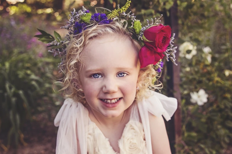 a little girl with a flower crown on her head, a picture, by Jason Felix, portrait imagery, smiling as a queen of fairies, rose in hair, brooke ashling