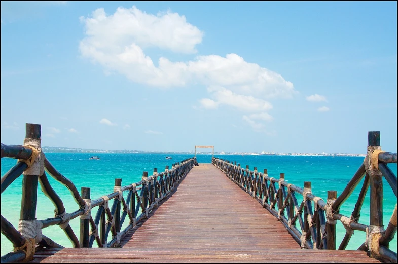 a wooden bridge over a body of water, by Simon Gaon, shutterstock, somalia, turquoise horizon, shot on nikon d 3 2 0 0, romantic!!!