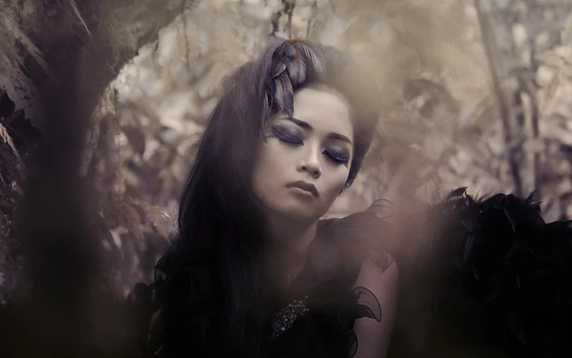 a woman in a black dress posing for a picture, inspired by Bastien L. Deharme, gothic art, geisha photo portrait, beautiful elf with violet skin, tired and haunted expression, amidst nature