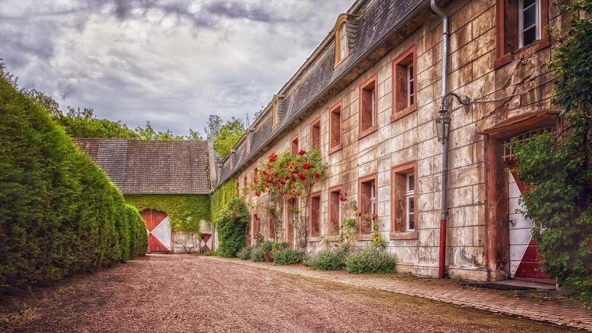 a red and white fire hydrant sitting on the side of a road, by Etienne Delessert, renaissance, beautiful house on a forest path, portal made of roses, tonemapped, of augean stables