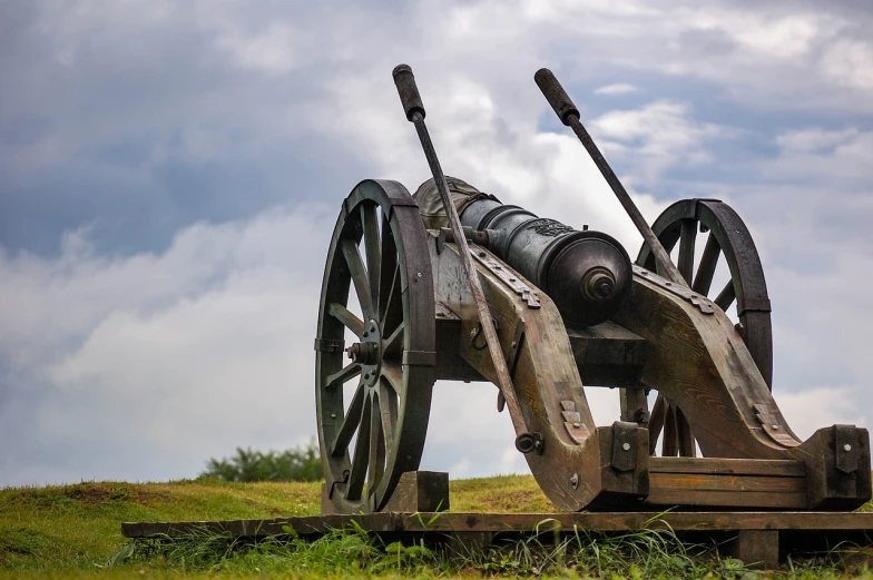 a cannon sitting on top of a wooden platform, by Walenty Wańkowicz, shutterstock, figuration libre, victorious on a hill, low angle photo, massive battery, side view of a gaunt