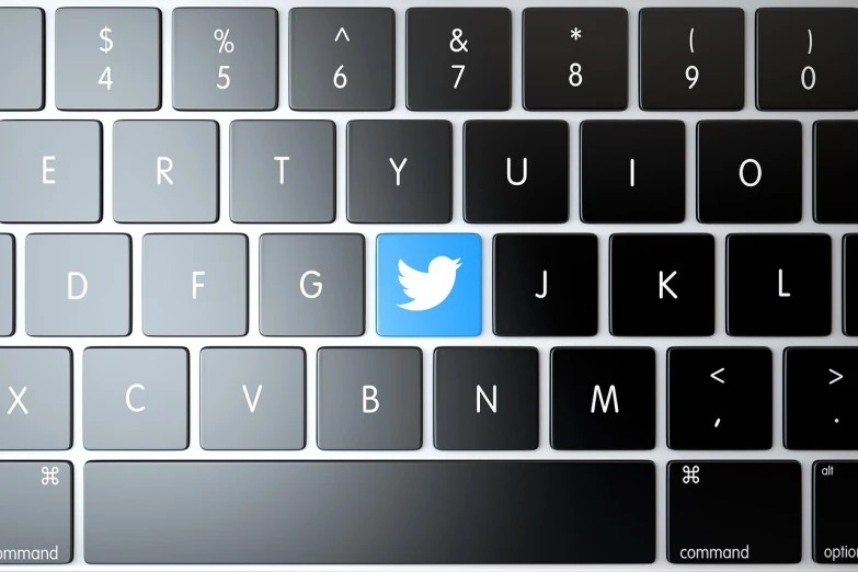 a computer keyboard with a twitter logo on it, a screenshot, by Paul Bird, shutterstock, digital art, photoshop render, shade, in style of mike savad”, perfect kerning
