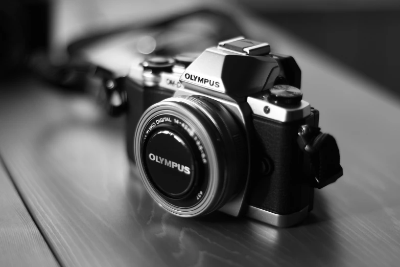 a black and white photo of a camera, a picture, unsplash, photorealism, olympus platform, ultrasharp focus, posing for a picture, today\'s featured photograph 4k