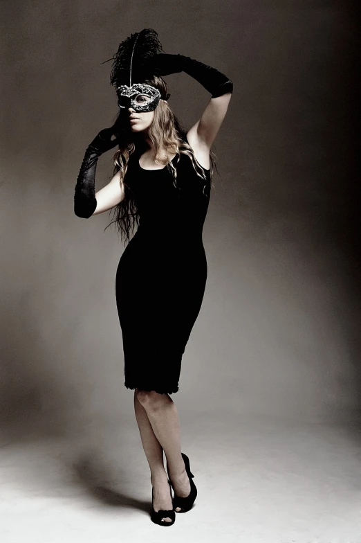 a woman in a black dress and a mask, tumblr, madonna, full body shoot, kiera knightly, blindfold