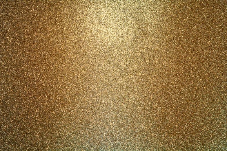 a close up of a shiny metal surface, a stipple, shutterstock, gold background, sparkles and glitter, brown background, floor texture