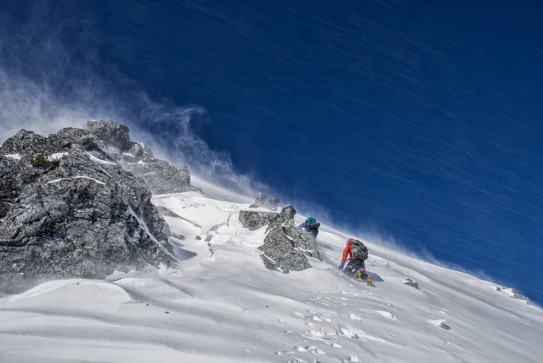 a man riding skis down the side of a snow covered slope, by Werner Andermatt, grim crushing atmosphere, ivan shishkin and greg rutkowski, rocky terrain, ruan jia and michael komarck