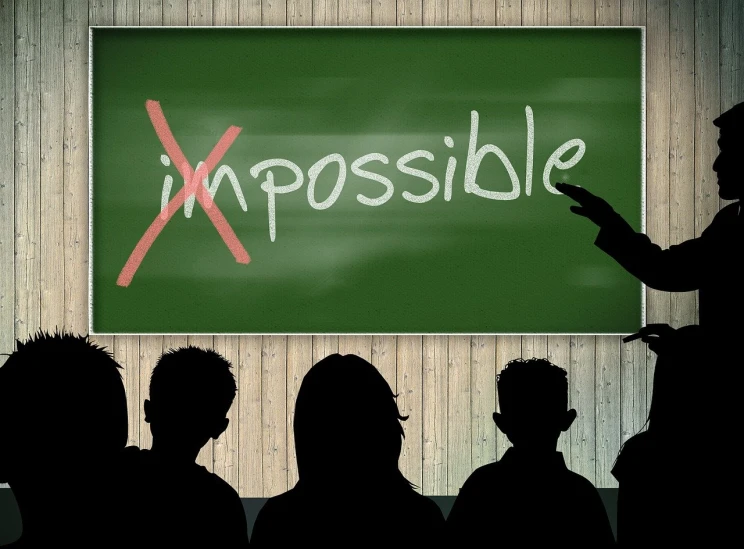 a group of people standing in front of a blackboard, a picture, inspired by John Maxwell, pixabay, happening, impossible detail, word, kim possible, photo of a classroom