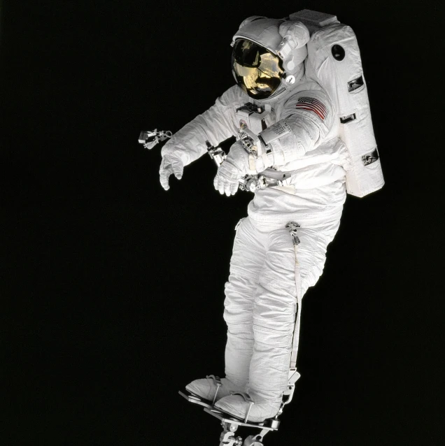 an astronaut flying through the air on a skateboard, by Alan Bean, flickr, standing with a black background, reflective suit, 1998 photo, full body close-up shot