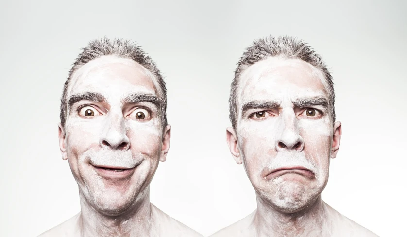 a man with white paint on his face and another man with white paint on his face, a picture, shutterstock, hyperrealism, funny cartoonish, frustrated face, slender symmetrical face, advertising photo