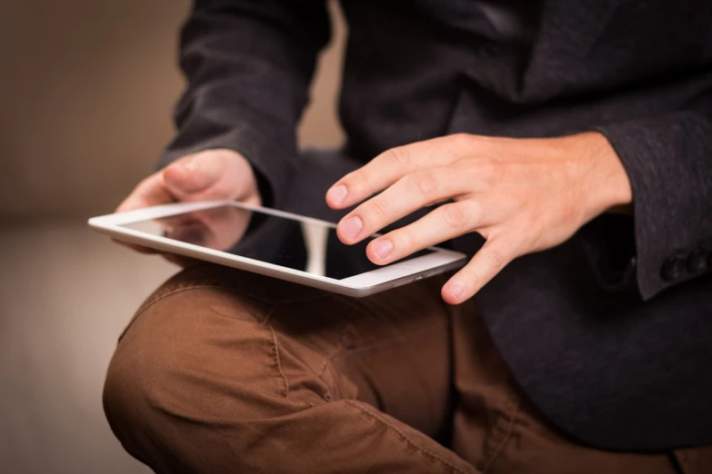 a close up of a person holding a tablet, by Juan O'Gorman, figuration libre, istock, sitting on man's fingertip, elegant pose, high quality detail