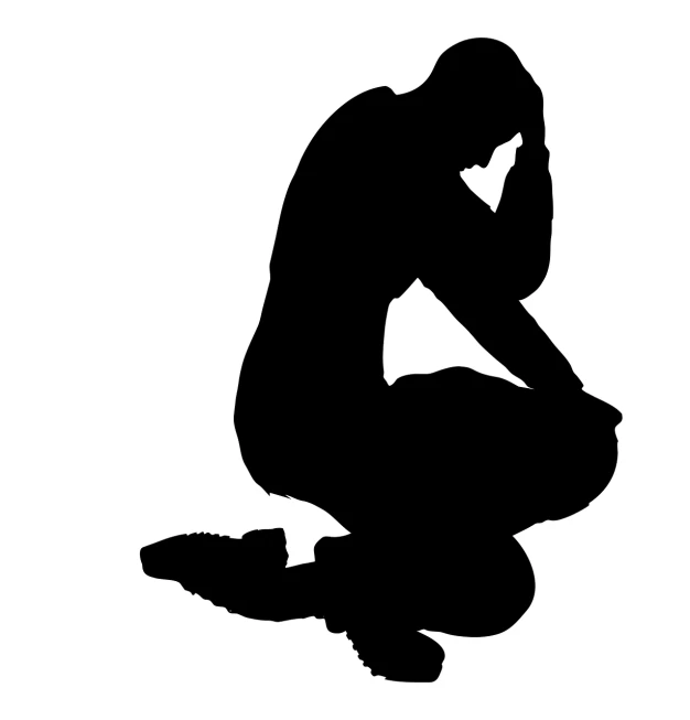 a silhouette of a man kneeling down with his head in his hands, a cartoon, pixabay, figuration libre, mourning, wrestler, istockphoto, isolated on white