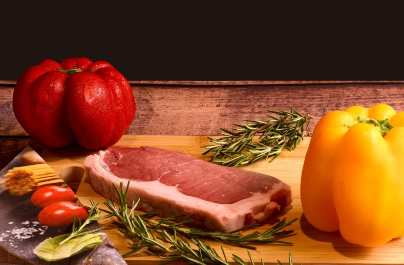 a wooden cutting board topped with meat and vegetables, a picture, by Juan O'Gorman, shutterstock, realism, background image, stock photo, on black background, restaurant menu photo