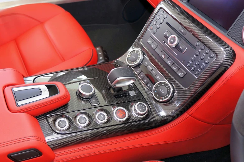 a close up of a dashboard in a car, inspired by Otto Abt, les automatistes, fine details. red, slr, chrome and carbon, fantastic vendor interior