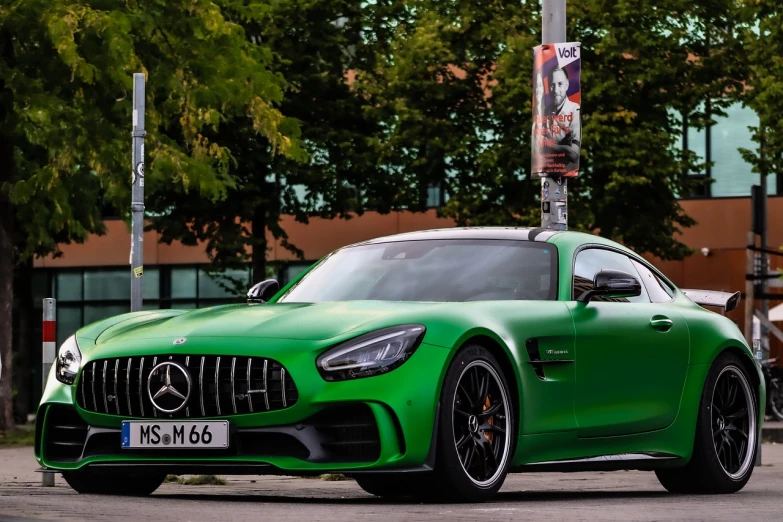 a green mercedes sports car parked on the side of the road, a picture, by Hans Schwarz, pexels, happy birthday, green square, srgb, full of colour w 1024