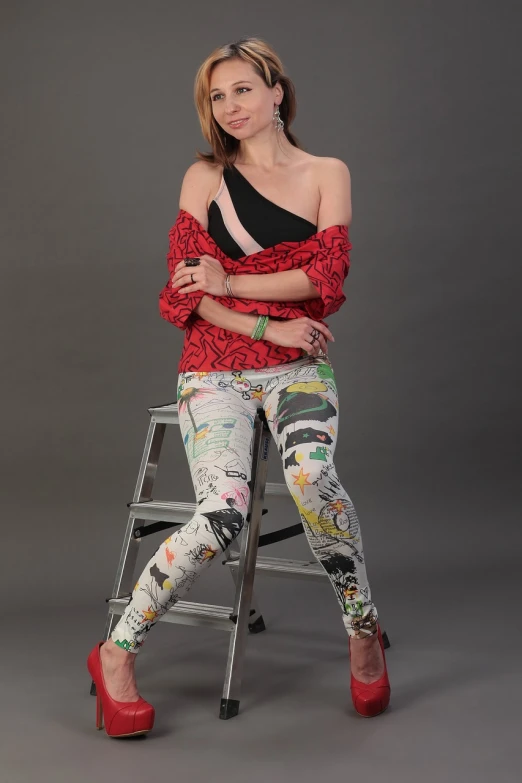 a woman sitting on top of a ladder, inspired by Larry Rivers, graffiti, leggins, full body photo